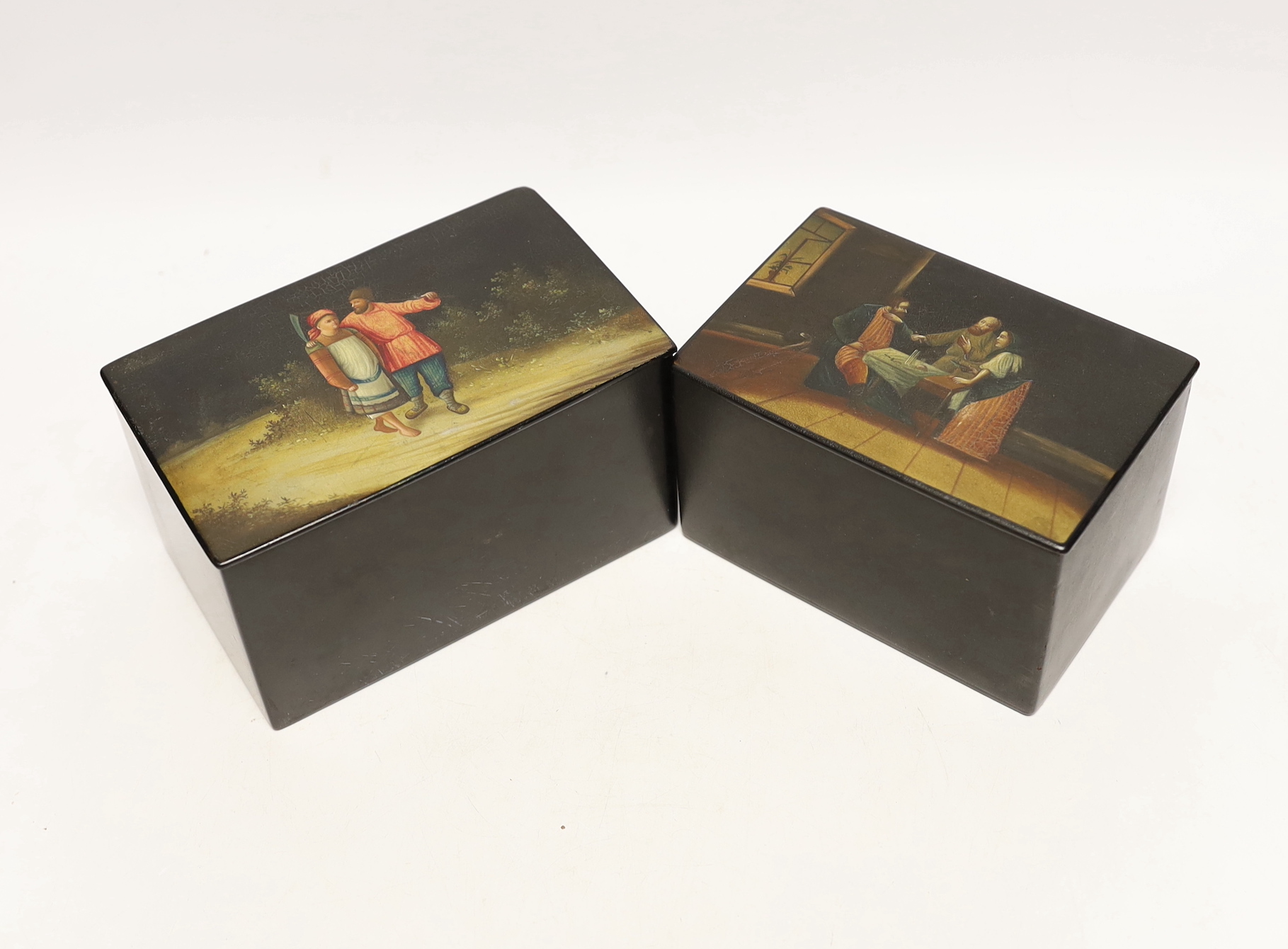 Two late 19th century Russian lacquer tea caddies, by Vishnyakov, largest 16cm x 9cm